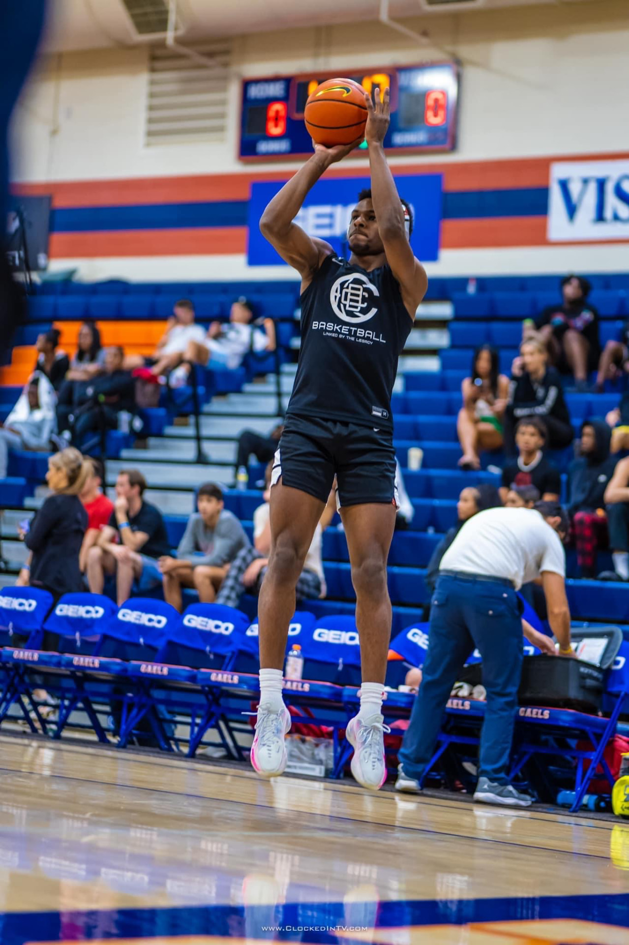 Player rising for a jump shot during warmups