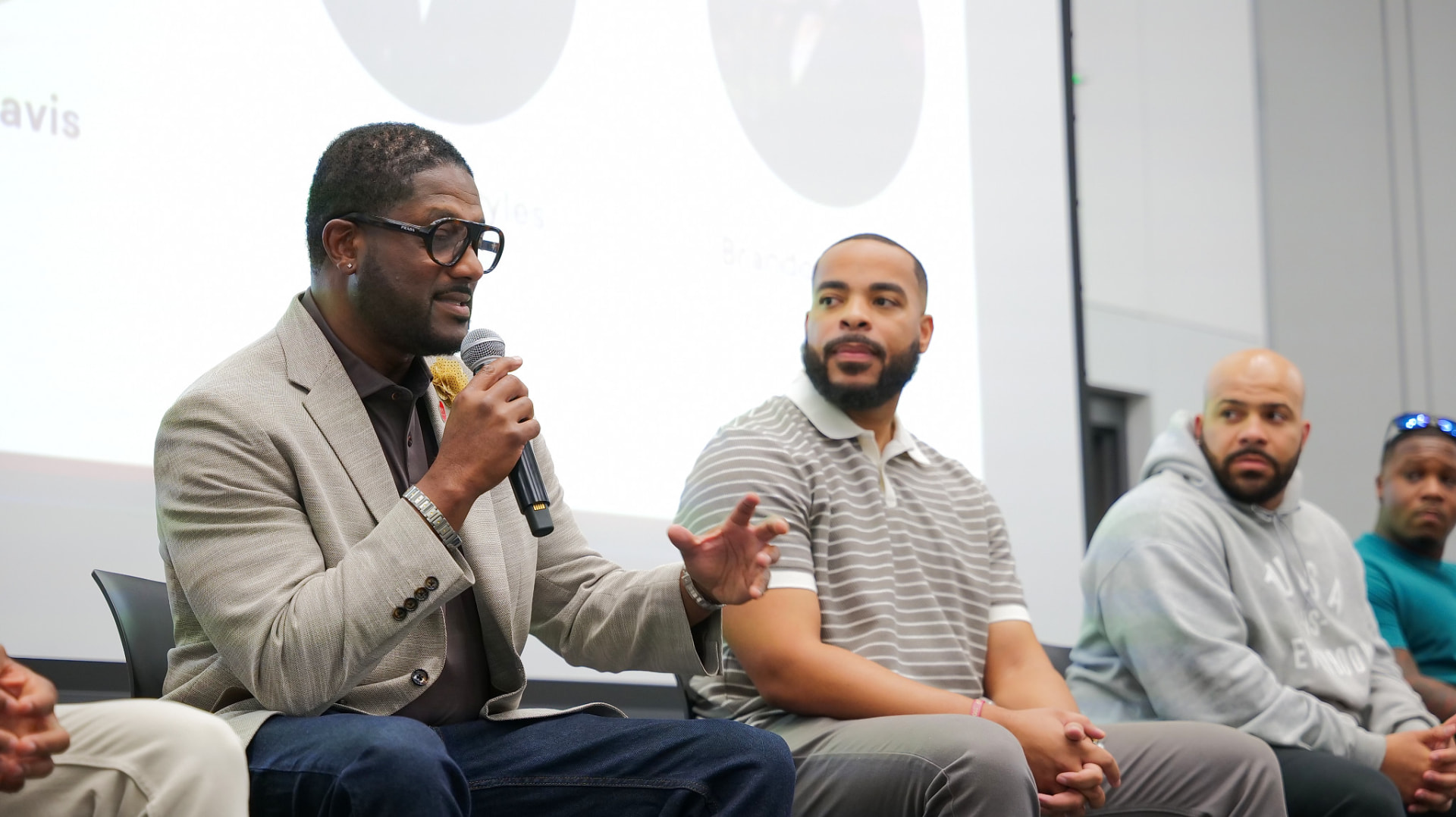 Panel discussion with community leaders sharing the mic