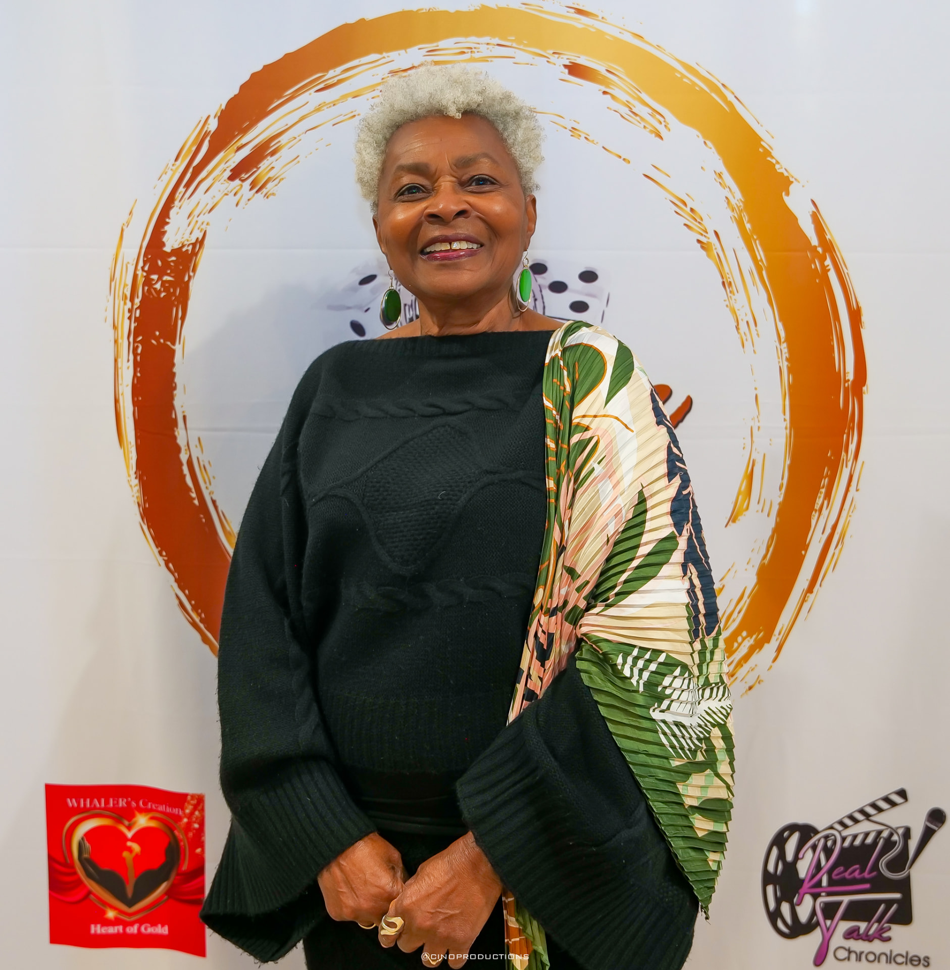 Community elder on the step-and-repeat at a Heart of Gold event