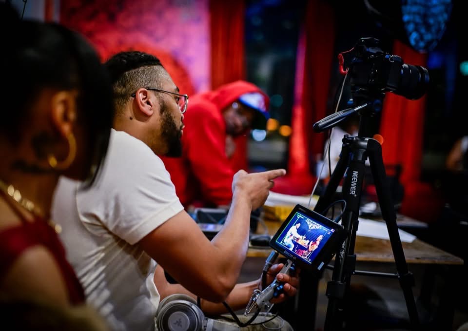 Directing actors on set